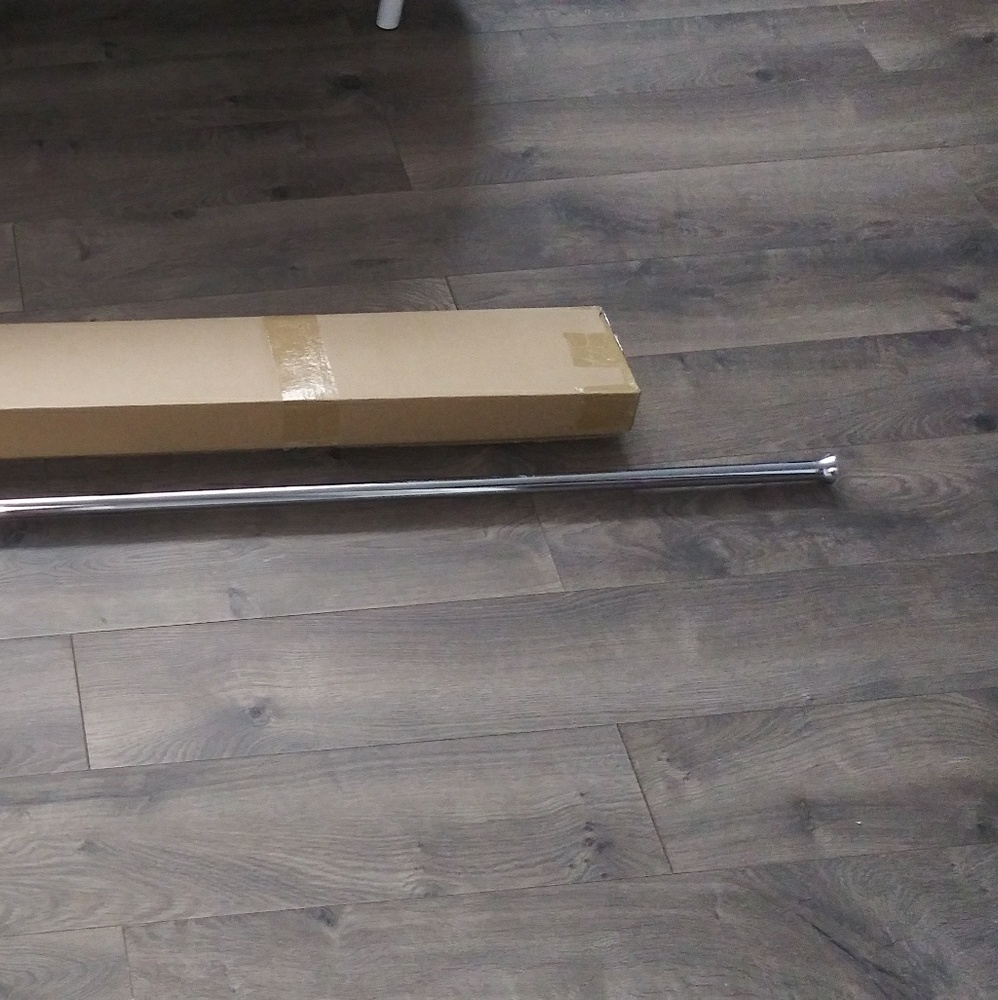 Hi! Beautiful chrome shower curtain rod